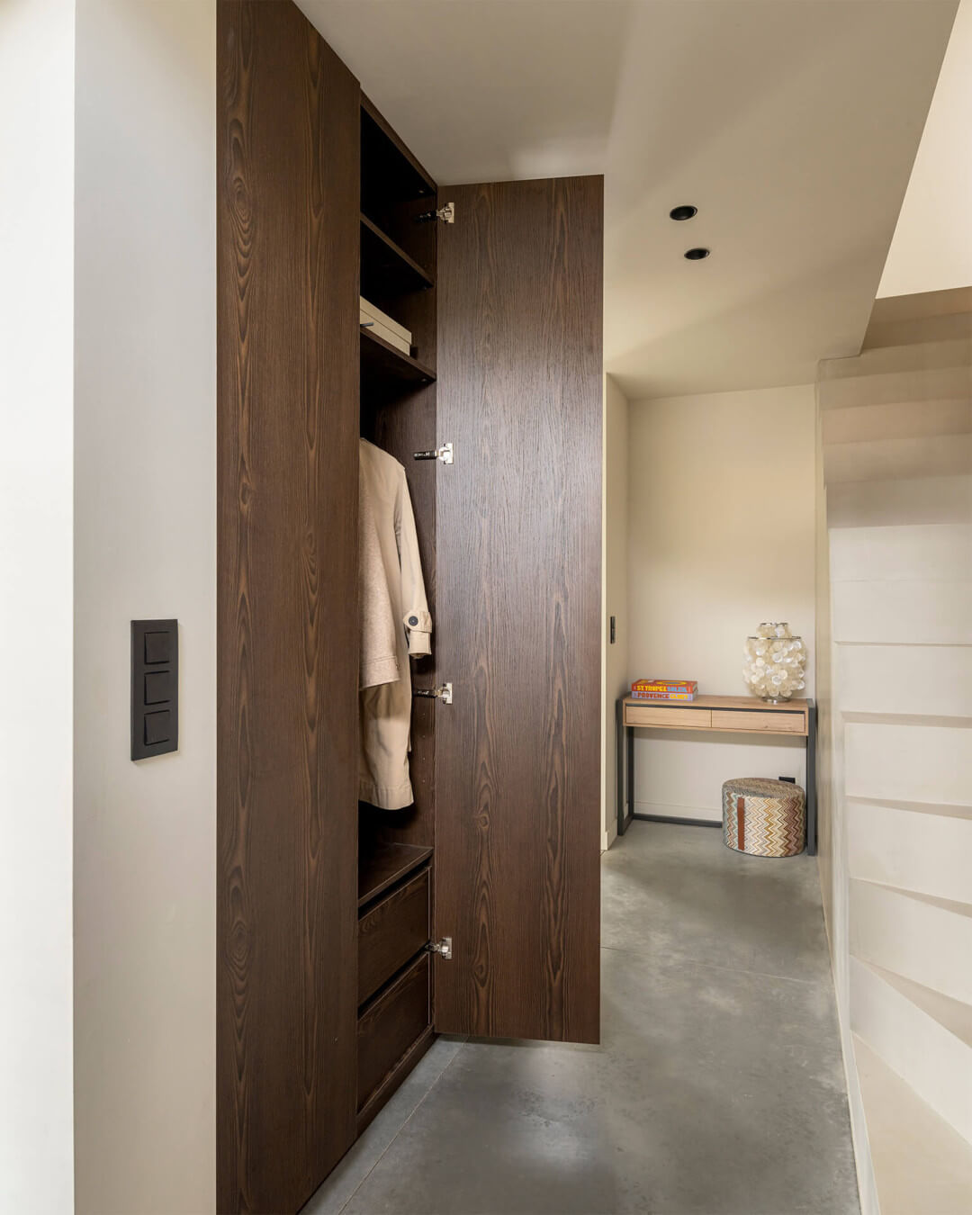 Custom hall closet in dark wood