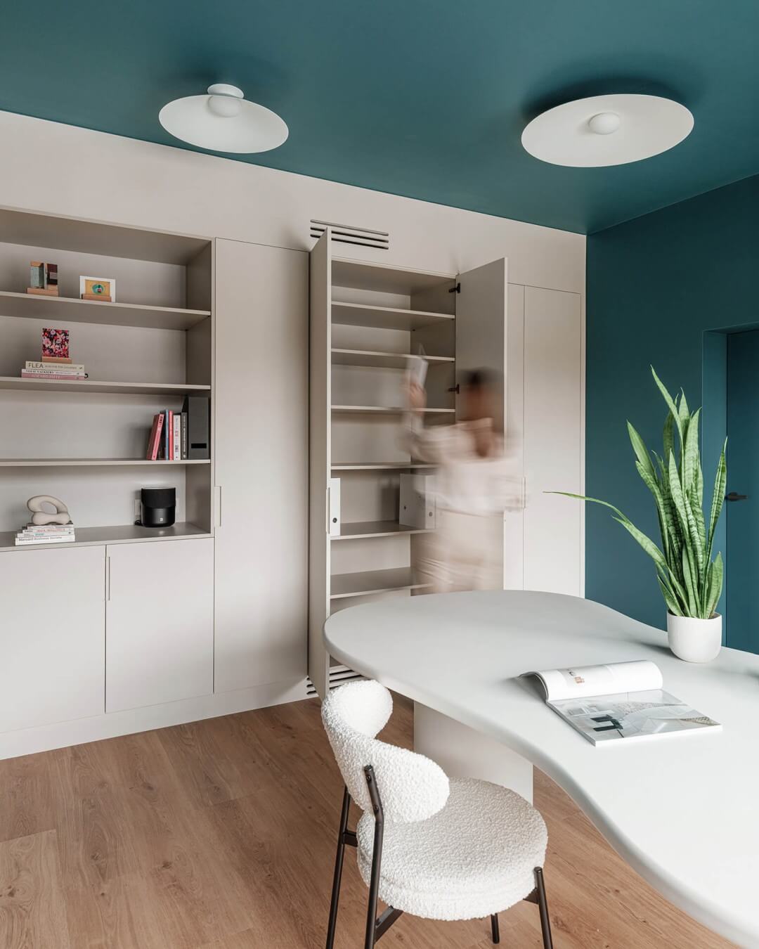 Bespoke storage cupboard in desk cupboard and textured paint finish