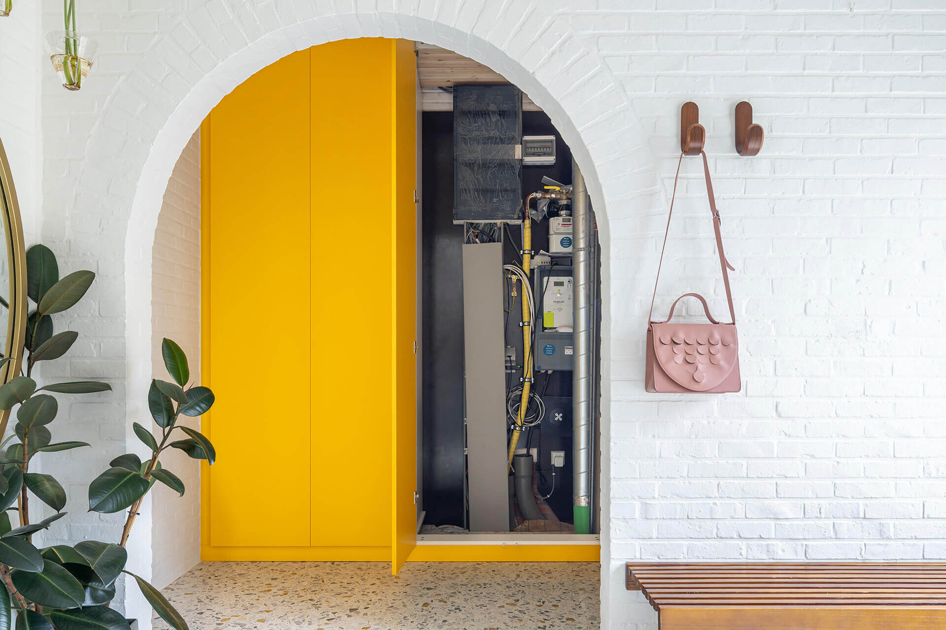 Custom-built cabinet to conceal pipes