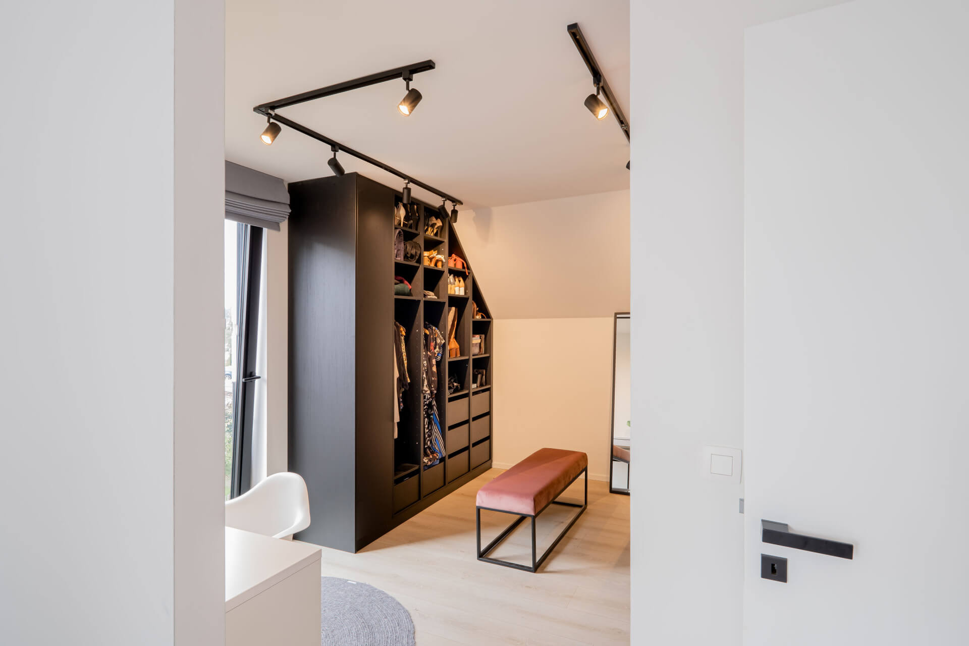 Custom wardrobe for a slanted roof