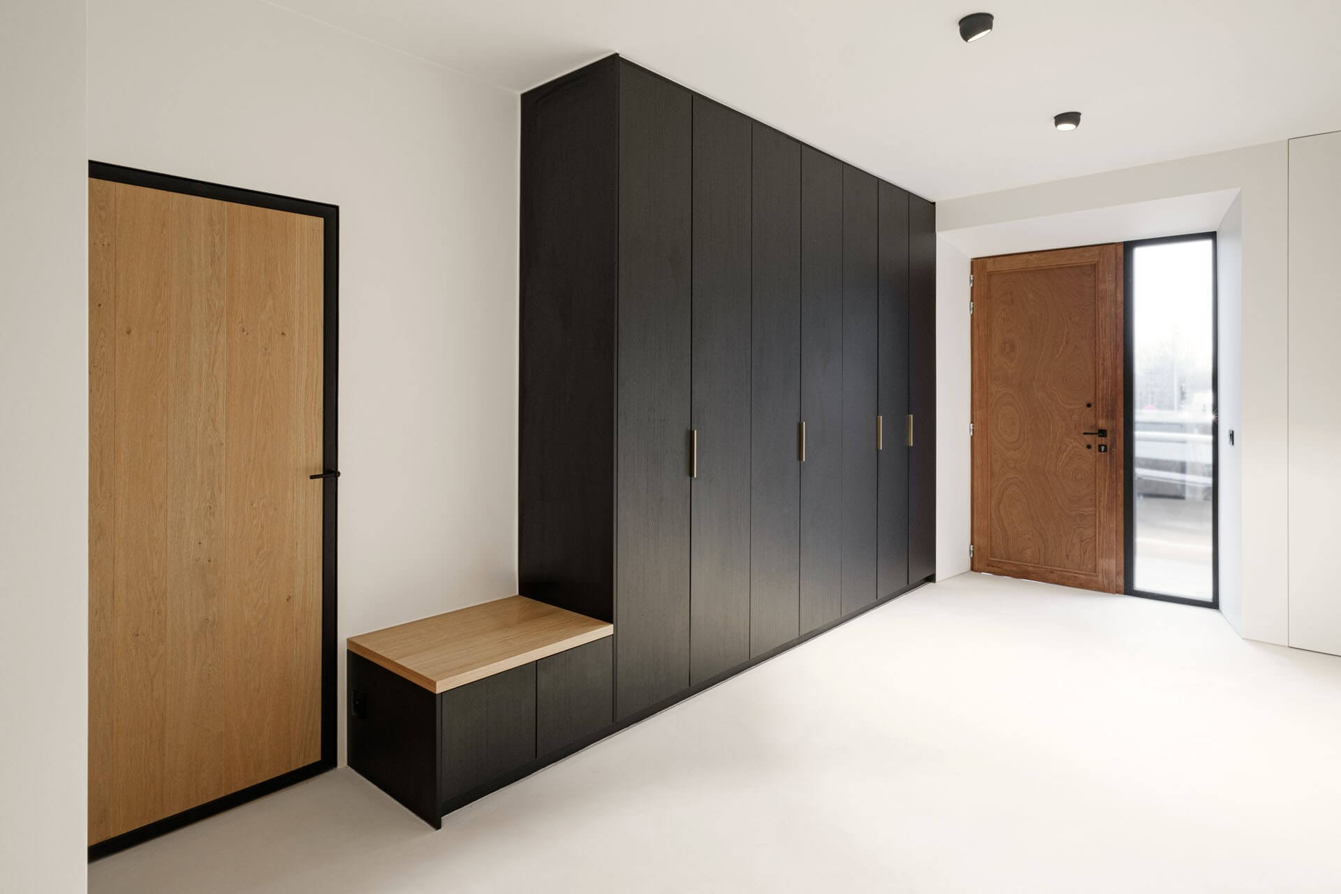 Bespoke bench with cloakroom in entrance hall