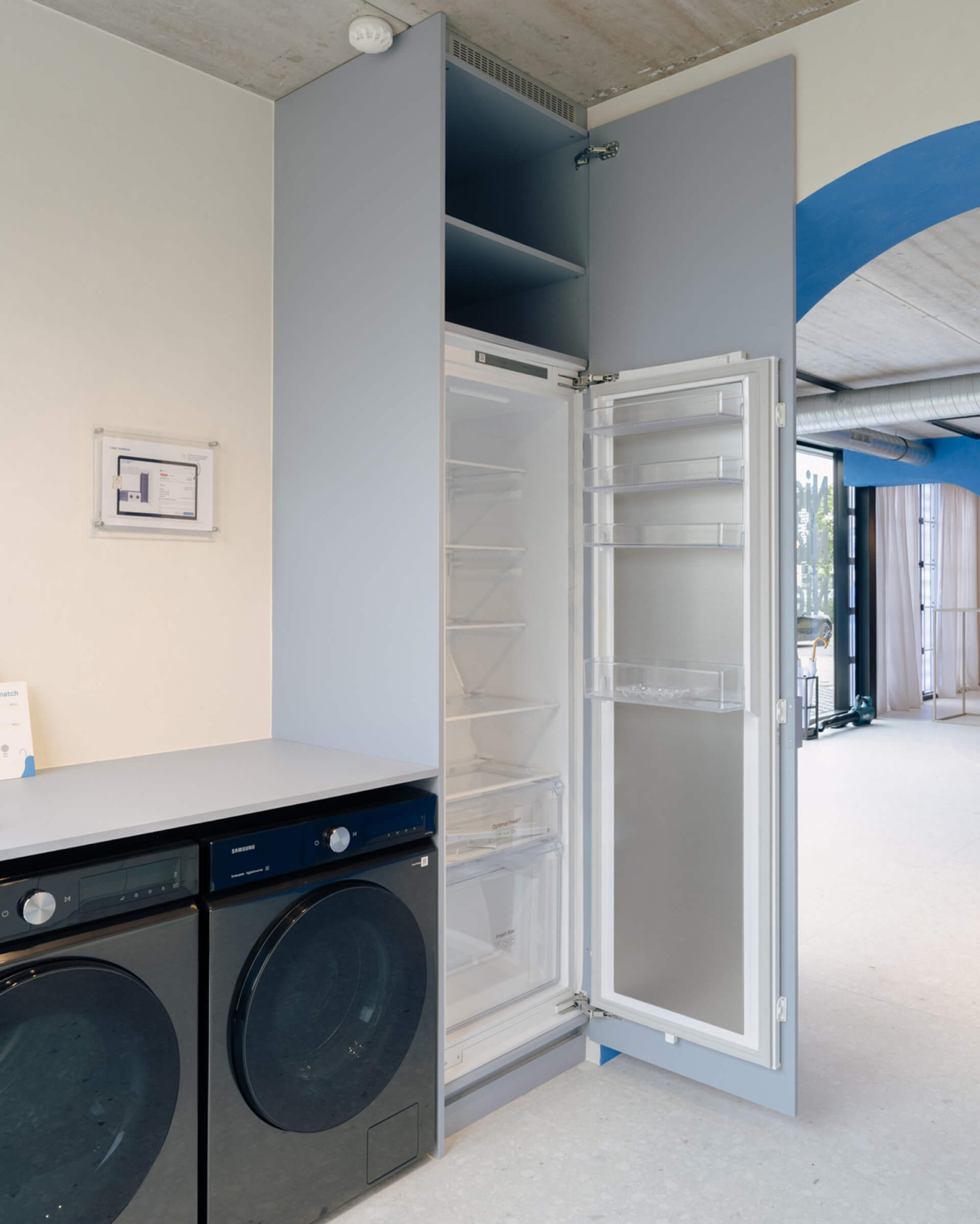 Kast op maat voor een inbouwkoelkast en wasmachine en droogkast