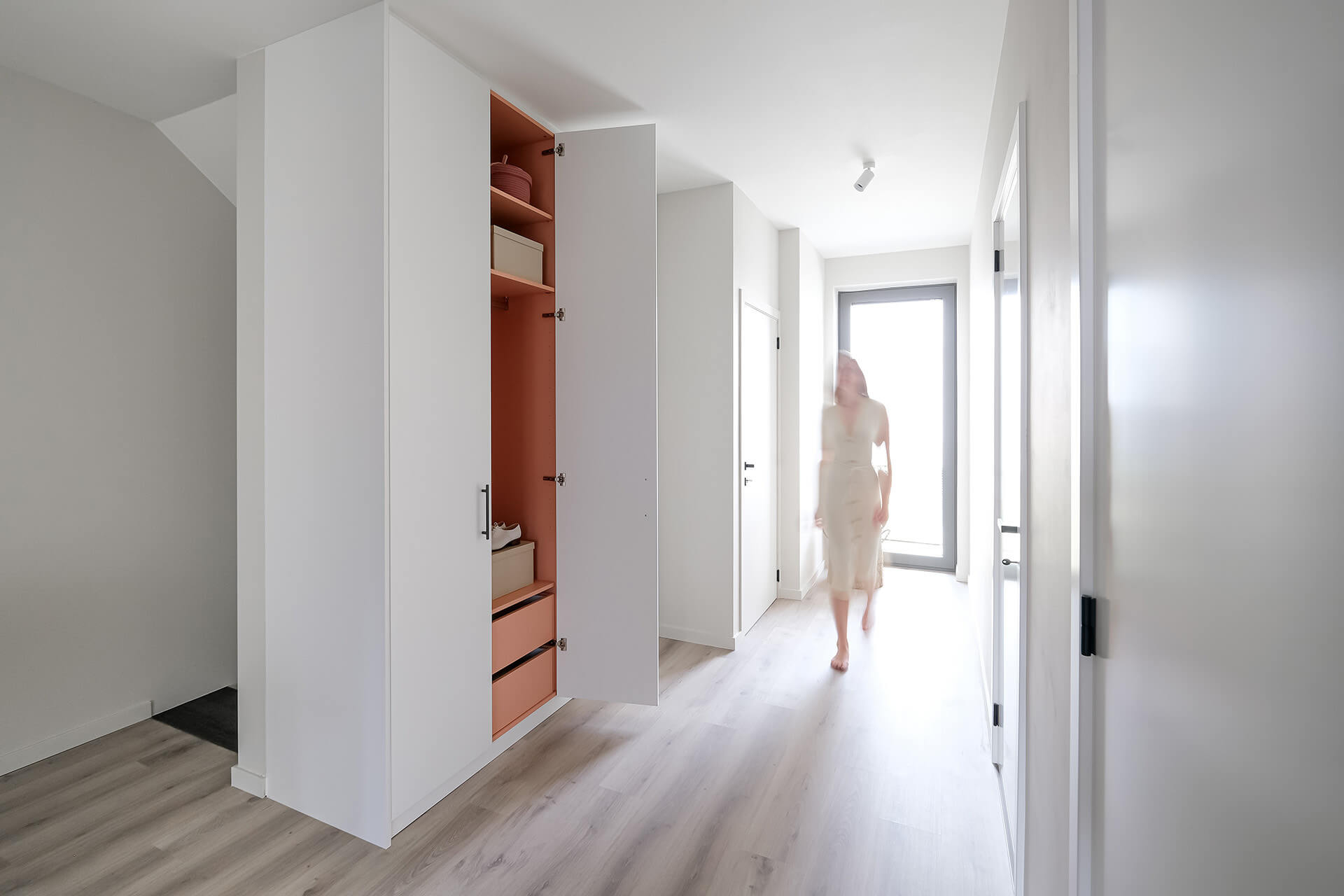 Made-to-measure storage cupboard in mdf with long milled handles